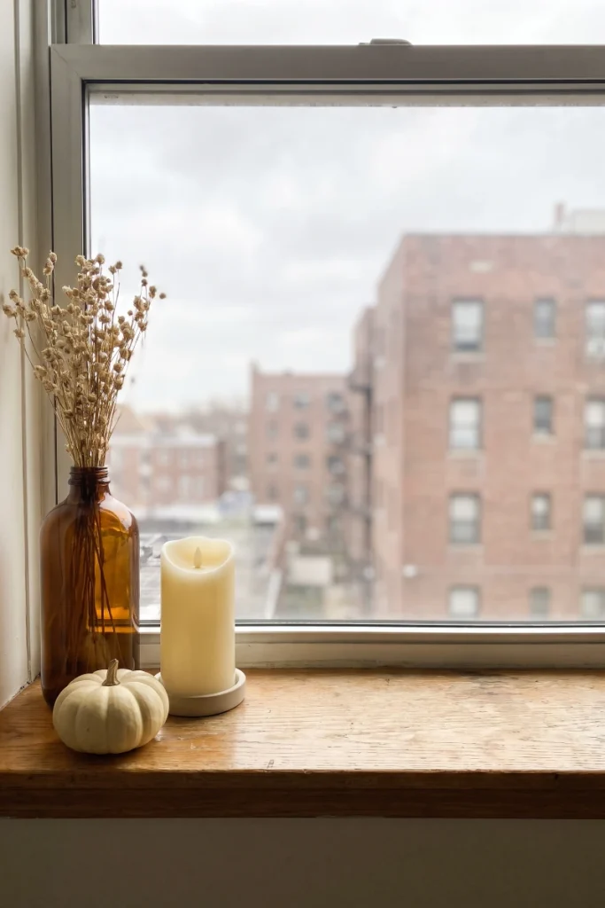 Style One Windowsill Using Three Heights — dollar store fall decor idea for a small apartment